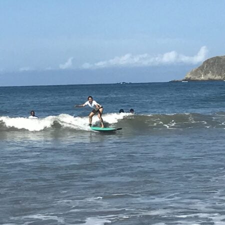 Learning how to surf on Spanish immersion in Costa Rica