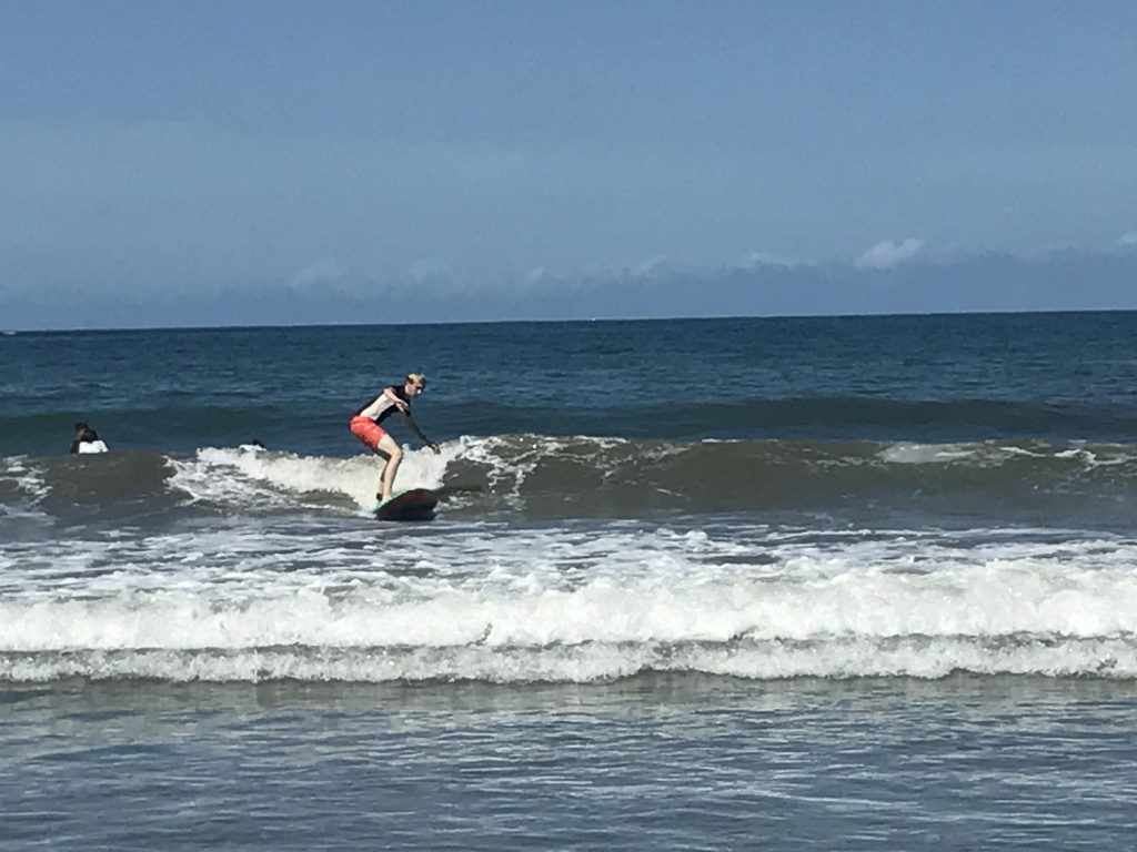 Learning how to surf on Spanish immersion in Costa Rica